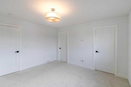 198 Dawson Harbour Hill, Chestermere, AB - Indoor Photo Showing Other Room