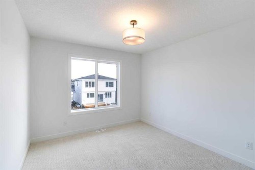 198 Dawson Harbour Hill, Chestermere, AB - Indoor Photo Showing Other Room