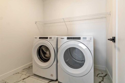 198 Dawson Harbour Hill, Chestermere, AB - Indoor Photo Showing Laundry Room