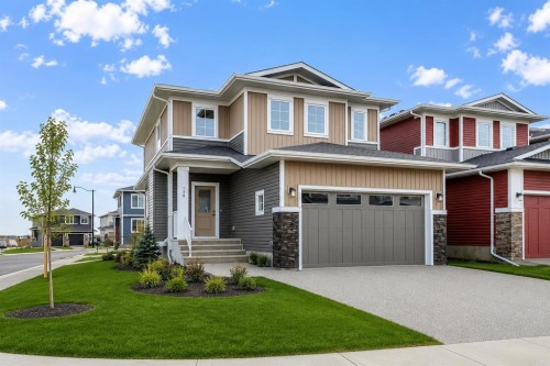 198 Dawson Harbour Hill, Chestermere, AB - Outdoor With Facade