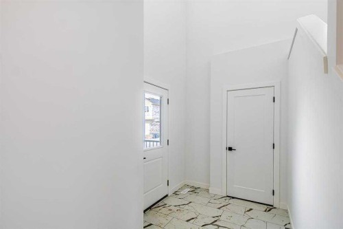 198 Dawson Harbour Hill, Chestermere, AB - Indoor Photo Showing Other Room