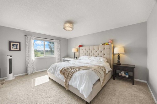 208 Panton Road Nw, Calgary, AB - Indoor Photo Showing Bedroom