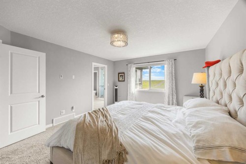 208 Panton Road Nw, Calgary, AB - Indoor Photo Showing Bedroom