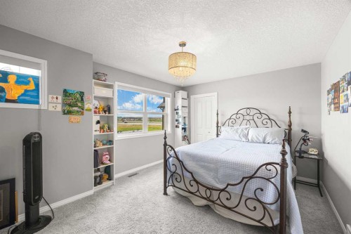 208 Panton Road Nw, Calgary, AB - Indoor Photo Showing Bedroom