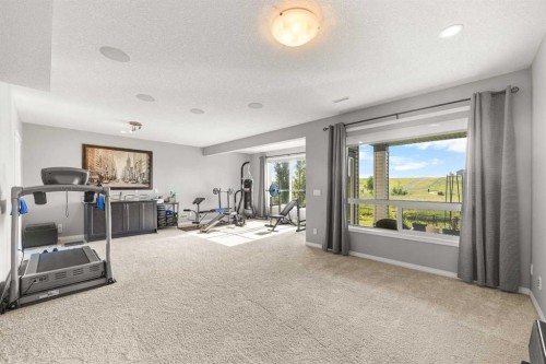 208 Panton Road Nw, Calgary, AB - Indoor Photo Showing Gym Room