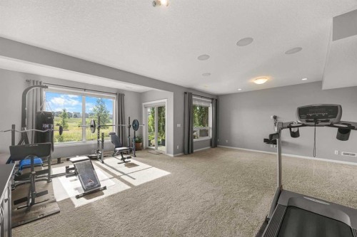 208 Panton Road Nw, Calgary, AB - Indoor Photo Showing Gym Room