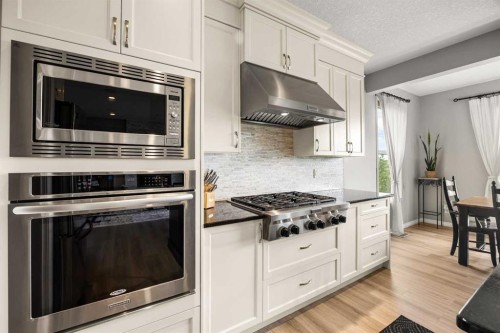 208 Panton Road Nw, Calgary, AB - Indoor Photo Showing Kitchen With Stainless Steel Kitchen With Upgraded Kitchen