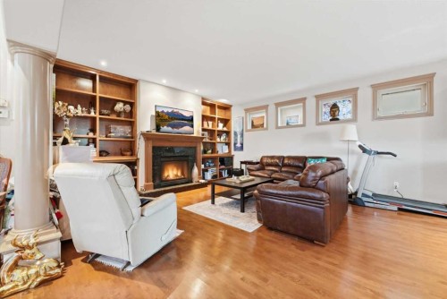 2245 25 Street Sw, Calgary, AB - Indoor Photo Showing Living Room With Fireplace