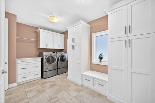 116 Panatella Rise Nw, Calgary, AB - Indoor Photo Showing Laundry Room
