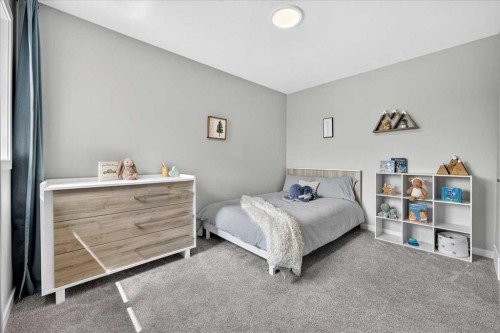 421 Magnolia Way Se, Calgary, AB - Indoor Photo Showing Bedroom