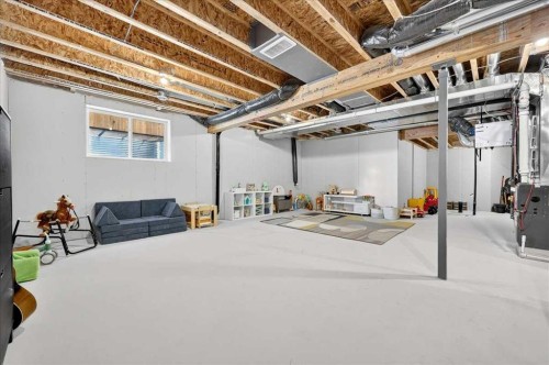 421 Magnolia Way Se, Calgary, AB - Indoor Photo Showing Basement