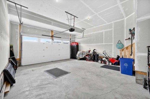 421 Magnolia Way Se, Calgary, AB - Indoor Photo Showing Garage