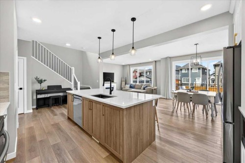421 Magnolia Way Se, Calgary, AB - Indoor Photo Showing Kitchen With Double Sink With Upgraded Kitchen