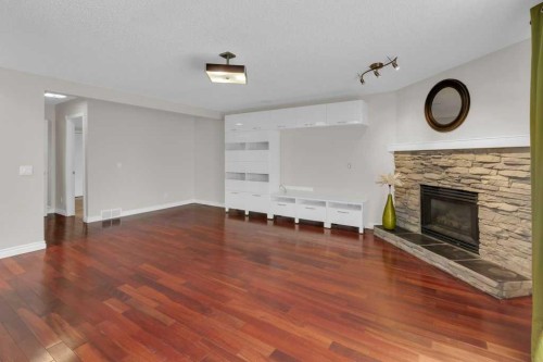 270 Arbour Ridge Park Nw, Calgary, AB - Indoor With Fireplace