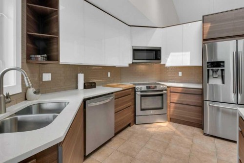 270 Arbour Ridge Park Nw, Calgary, AB - Indoor Photo Showing Kitchen With Stainless Steel Kitchen With Double Sink With Upgraded Kitchen