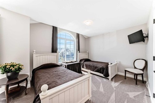 1449 Ravenscroft Avenue Se, Airdrie, AB - Indoor Photo Showing Bedroom