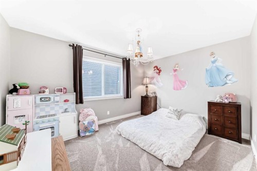 1449 Ravenscroft Avenue Se, Airdrie, AB - Indoor Photo Showing Bedroom
