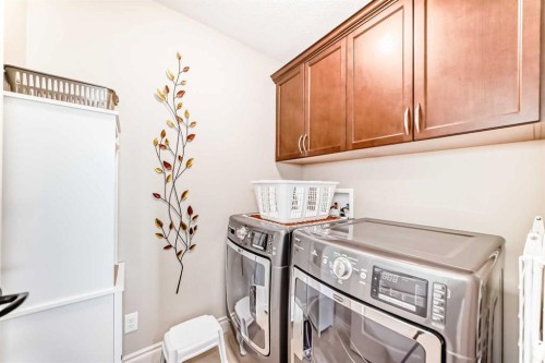 1449 Ravenscroft Avenue Se, Airdrie, AB - Indoor Photo Showing Laundry Room