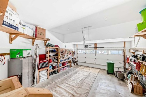 1449 Ravenscroft Avenue Se, Airdrie, AB - Indoor Photo Showing Garage