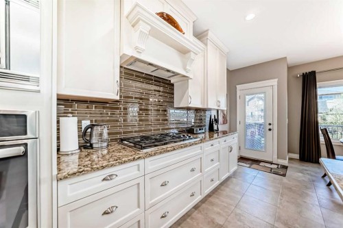 1449 Ravenscroft Avenue Se, Airdrie, AB - Indoor Photo Showing Kitchen With Upgraded Kitchen
