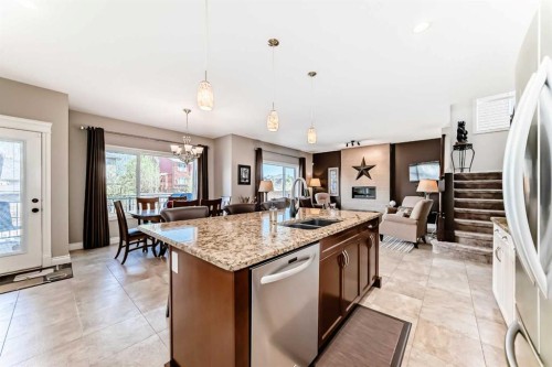1449 Ravenscroft Avenue Se, Airdrie, AB - Indoor Photo Showing Kitchen With Double Sink