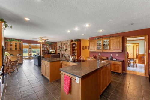 265028 Range Road 44, Rural Rocky View County, AB - Indoor Photo Showing Kitchen With Double Sink