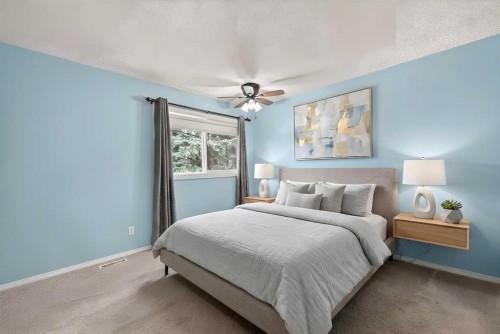 7-14736 Deerfield Drive Se, Calgary, AB - Indoor Photo Showing Bedroom
