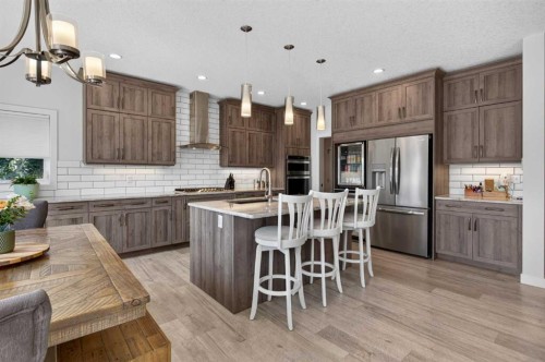 325 Bayside Crescent Sw, Airdrie, AB - Indoor Photo Showing Kitchen With Upgraded Kitchen