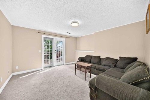 287 Harvest Oak Rise Ne, Calgary, AB - Indoor Photo Showing Living Room