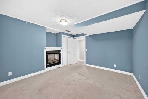 287 Harvest Oak Rise Ne, Calgary, AB - Indoor With Fireplace