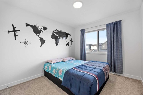 20604 Main Street Se, Calgary, AB - Indoor Photo Showing Bedroom