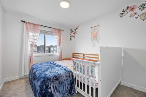 20604 Main Street Se, Calgary, AB - Indoor Photo Showing Bedroom