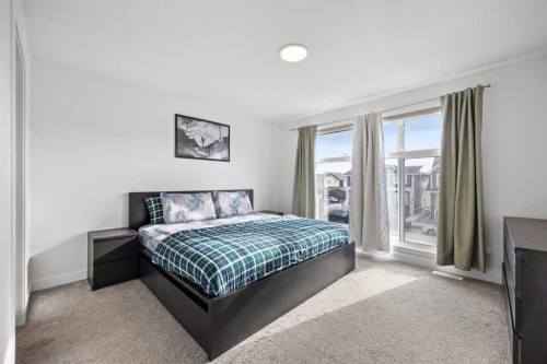 20604 Main Street Se, Calgary, AB - Indoor Photo Showing Bedroom