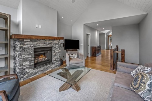 19 Creekside Mews, Canmore, AB - Indoor Photo Showing Living Room With Fireplace