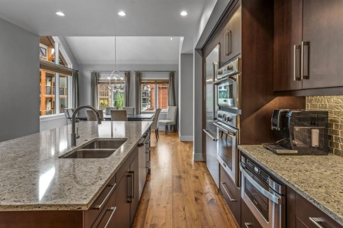 19 Creekside Mews, Canmore, AB - Indoor Photo Showing Kitchen With Double Sink With Upgraded Kitchen