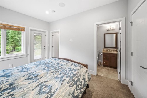 19 Creekside Mews, Canmore, AB - Indoor Photo Showing Bedroom