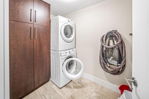 19 Creekside Mews, Canmore, AB - Indoor Photo Showing Laundry Room