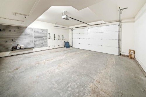 19 Creekside Mews, Canmore, AB - Indoor Photo Showing Garage