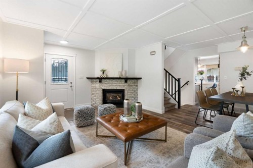 8424 Berkley Road Nw, Calgary, AB - Indoor Photo Showing Living Room With Fireplace