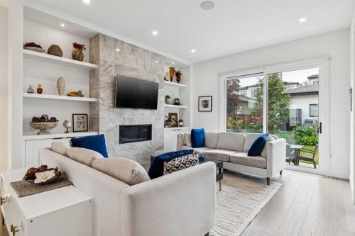 2435 29 Avenue Sw, Calgary, AB - Indoor Photo Showing Living Room With Fireplace
