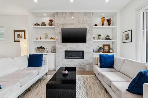 2435 29 Avenue Sw, Calgary, AB - Indoor Photo Showing Living Room With Fireplace