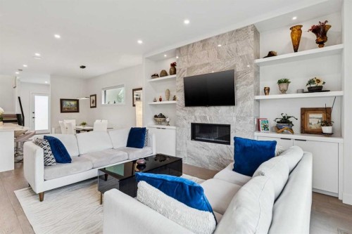 2435 29 Avenue Sw, Calgary, AB - Indoor Photo Showing Living Room With Fireplace