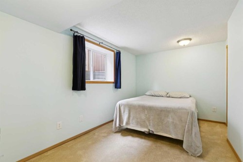6452 Silver Springs Way Nw, Calgary, AB - Indoor Photo Showing Bedroom
