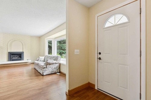 6452 Silver Springs Way Nw, Calgary, AB - Indoor Photo Showing Other Room With Fireplace