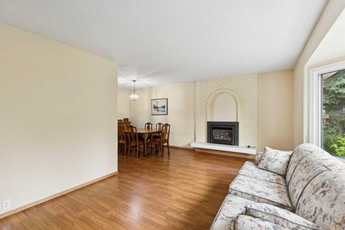 6452 Silver Springs Way Nw, Calgary, AB - Indoor Photo Showing Living Room With Fireplace