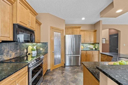 139 Tuscany Ridge Close Nw, Calgary, AB - Indoor Photo Showing Kitchen With Stainless Steel Kitchen With Upgraded Kitchen