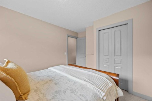 139 Tuscany Ridge Close Nw, Calgary, AB - Indoor Photo Showing Bedroom