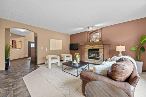 139 Tuscany Ridge Close Nw, Calgary, AB - Indoor Photo Showing Living Room With Fireplace