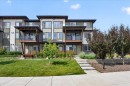 79-230 Seton Passage Se, Calgary, AB  - Outdoor With Balcony With Facade 
