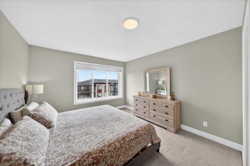 79-230 Seton Passage Se, Calgary, AB - Indoor Photo Showing Bedroom